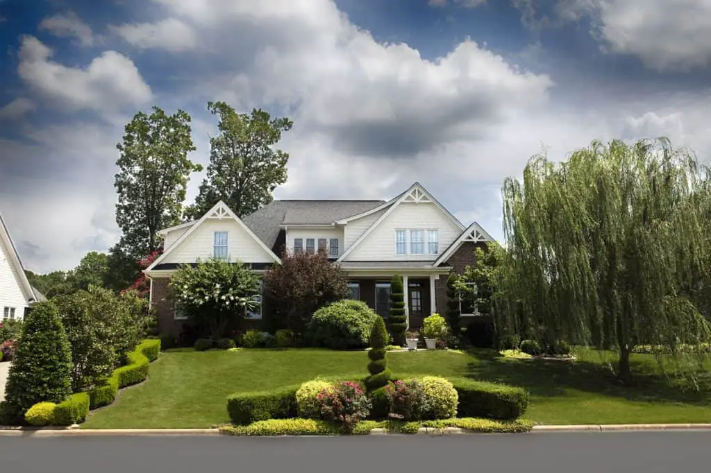 A house on the article Top 5 Low Growing Shrubs for Front of House