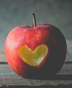 An apple with a heart shape